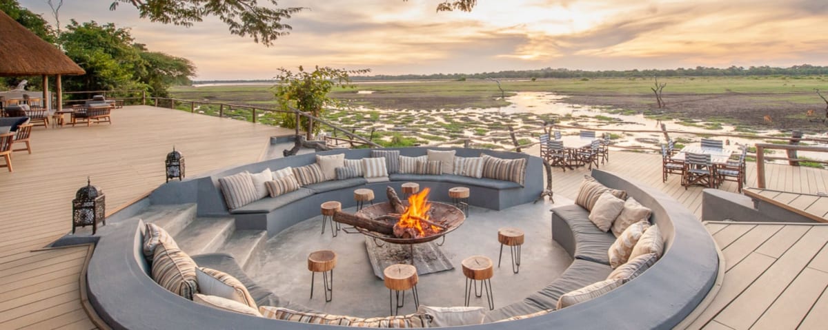 BANNER Zambia SouthLuangwa KafuntaRiverLodge FirePit 1200x479 1